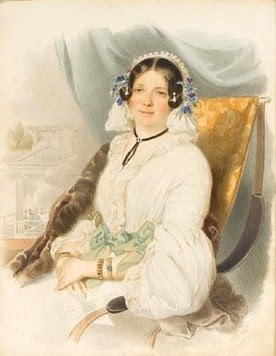 A lady, seated in a deckchair, wearing white dress with lace trim and green ribbon bows, lace headdress decorated with violets, black ribbon necklace, 1839 - Alexander Clarot