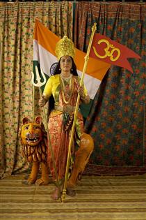 Motherland: Studio Photograph with Flag, Trishool and Om - Pushpamala N