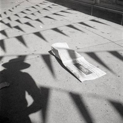Chicago (Vivian’s Shadow with Flags), July 1970, 1970 - Vivian Maier